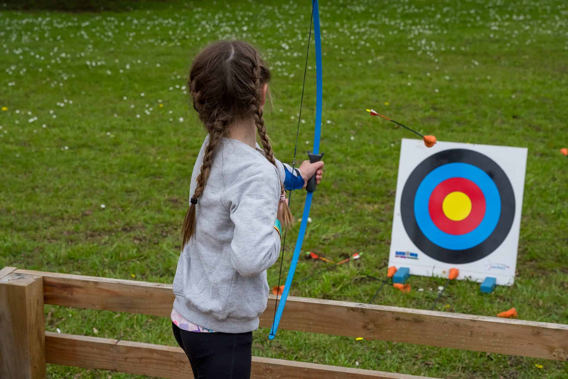 Child using soft archery Arrows kit