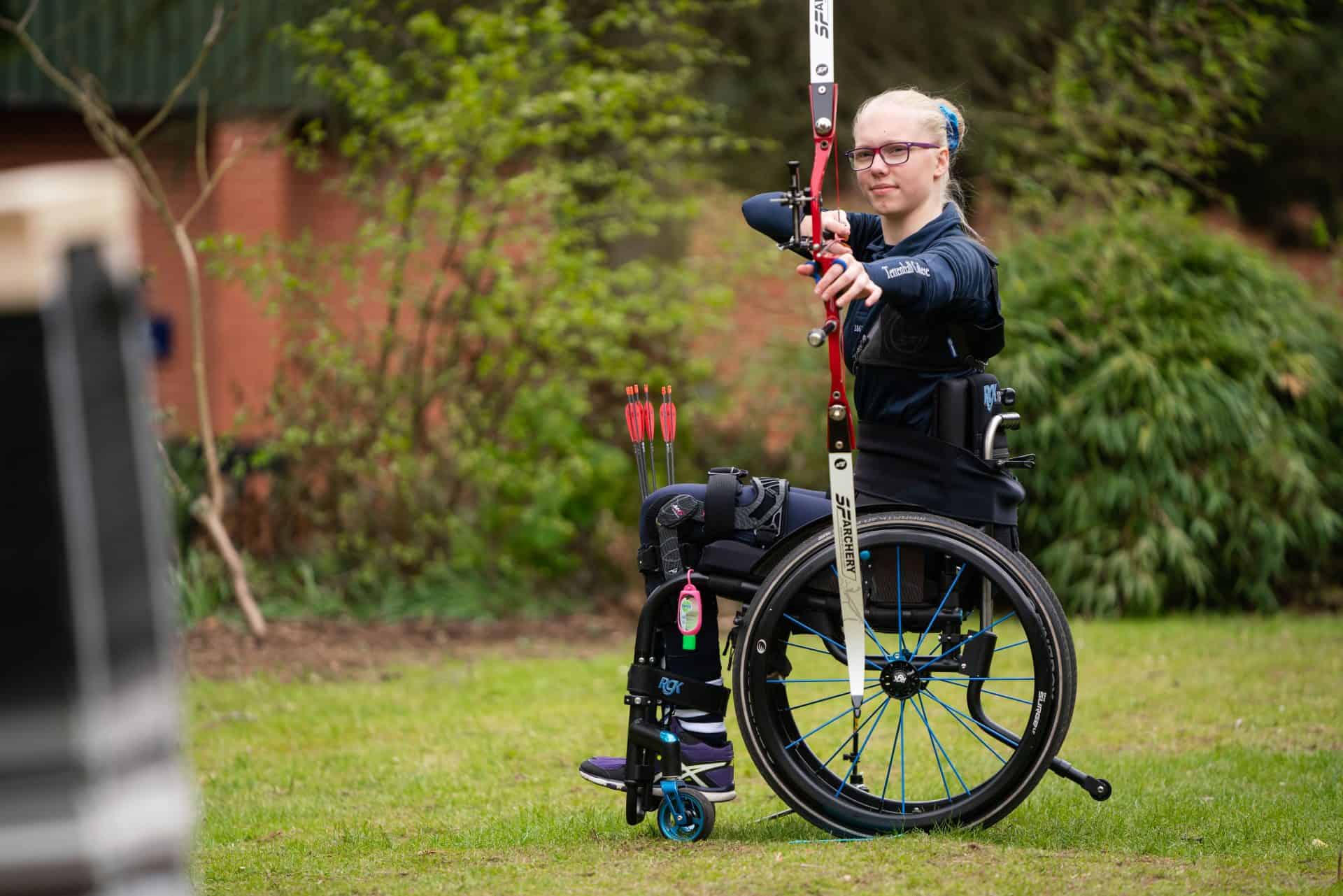 Female disabled archer in wheelchair